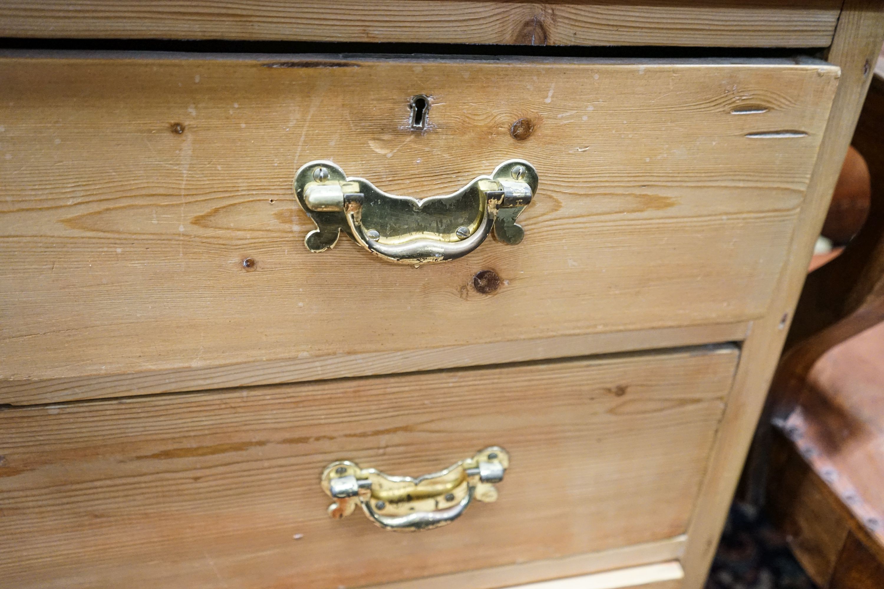 A Victorian pine chest, with three quarter gallery, four drawers and turned feet, width 96cm, depth 44cm, height 99cm